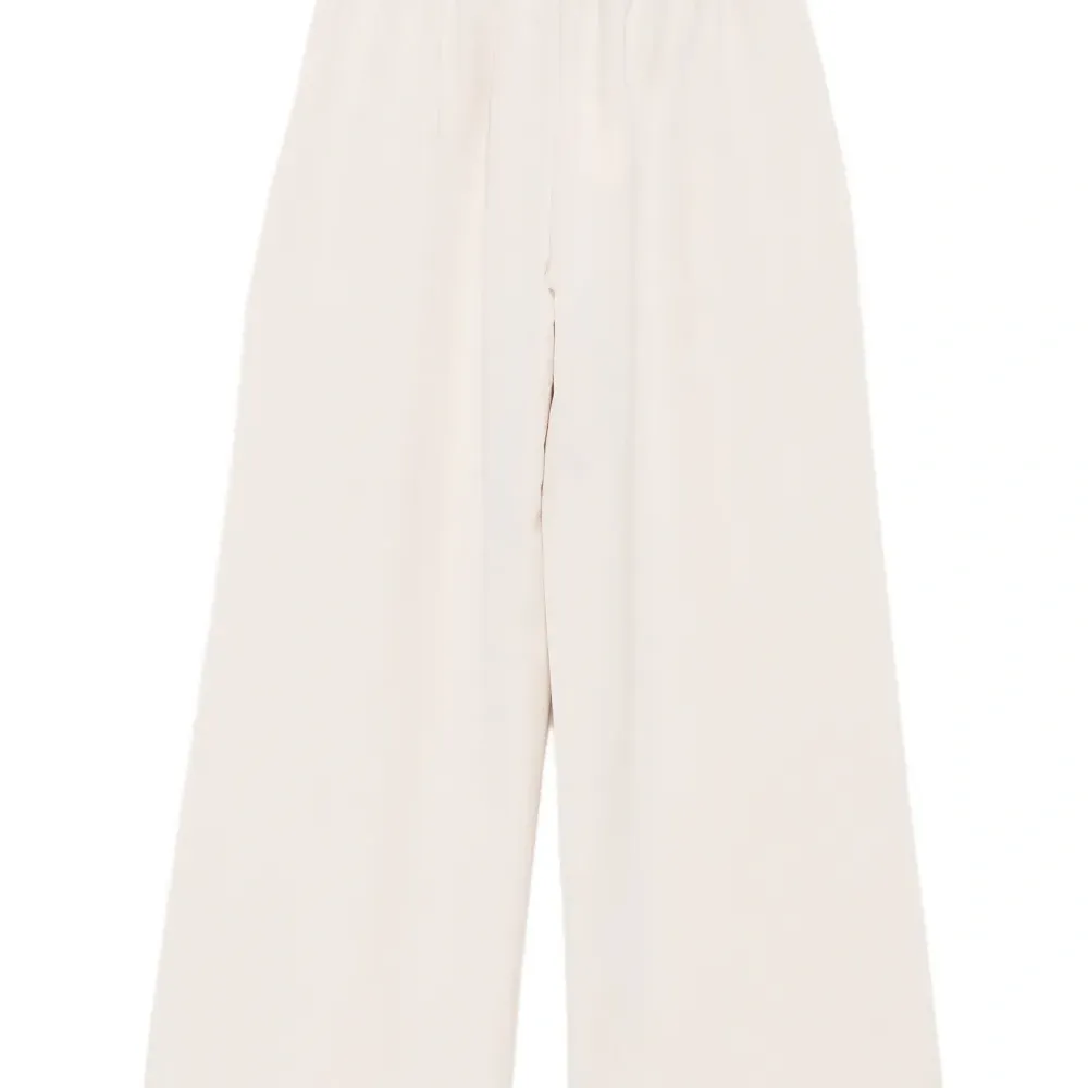 Брюки с эластичным поясом и застёжкой на пуговицы спереди