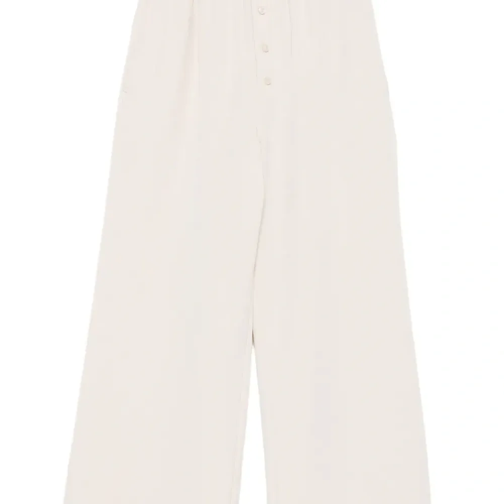 Брюки с эластичным поясом и застёжкой на пуговицы спереди