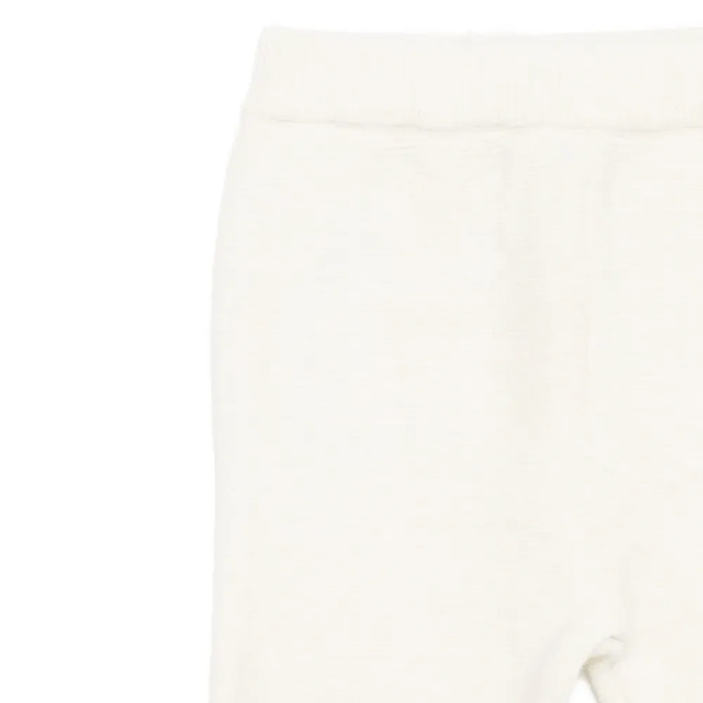 Костюм с брюками, отделанными кружевом