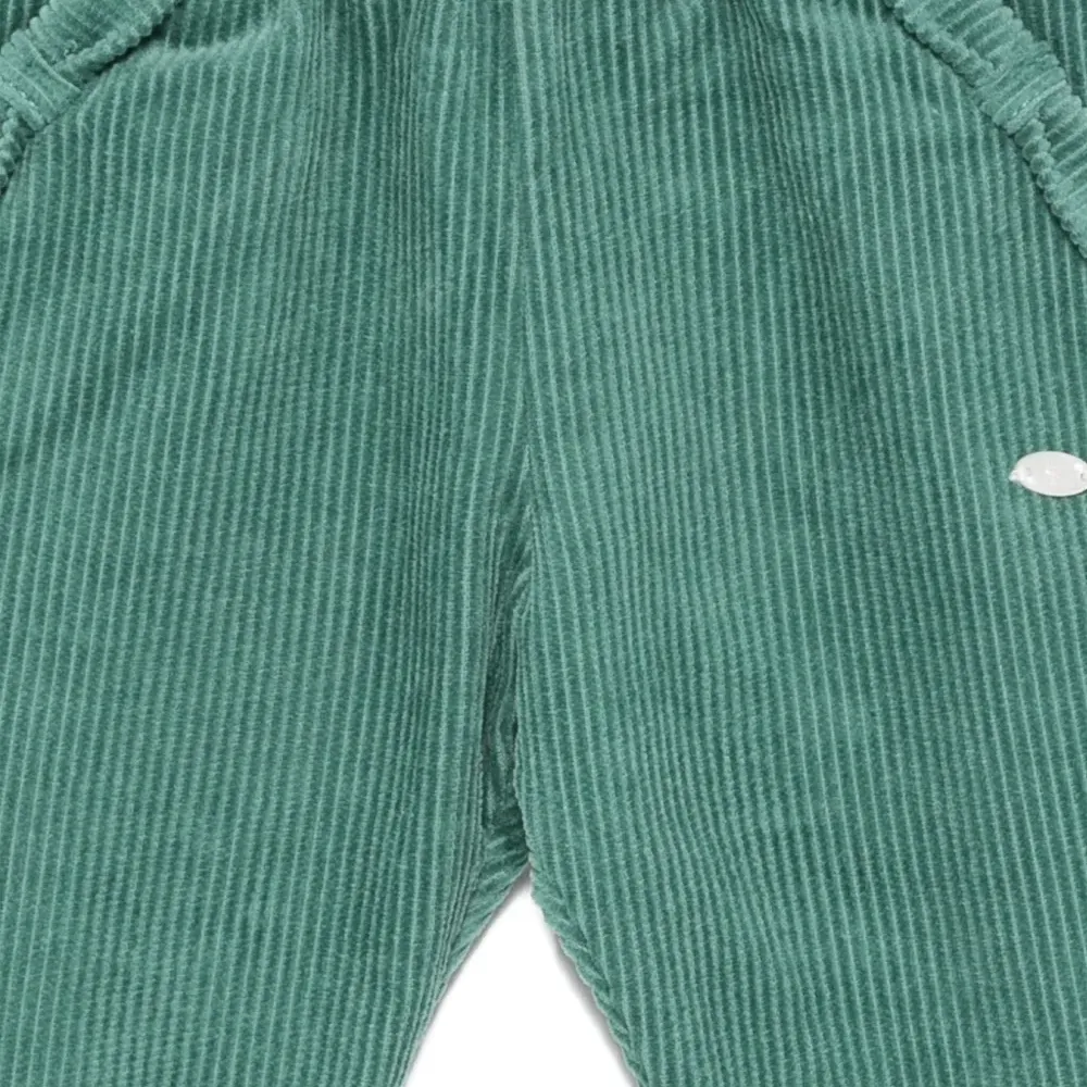 Брюки с карманами из вельвета