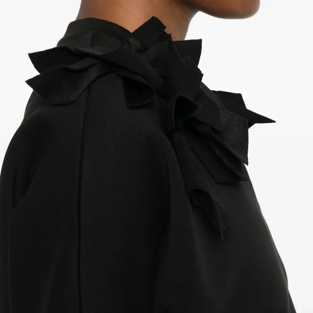 Блузка с бантом