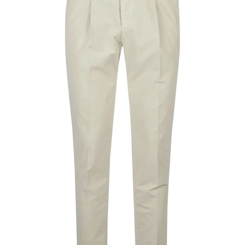 Брюки из хлопка в складку