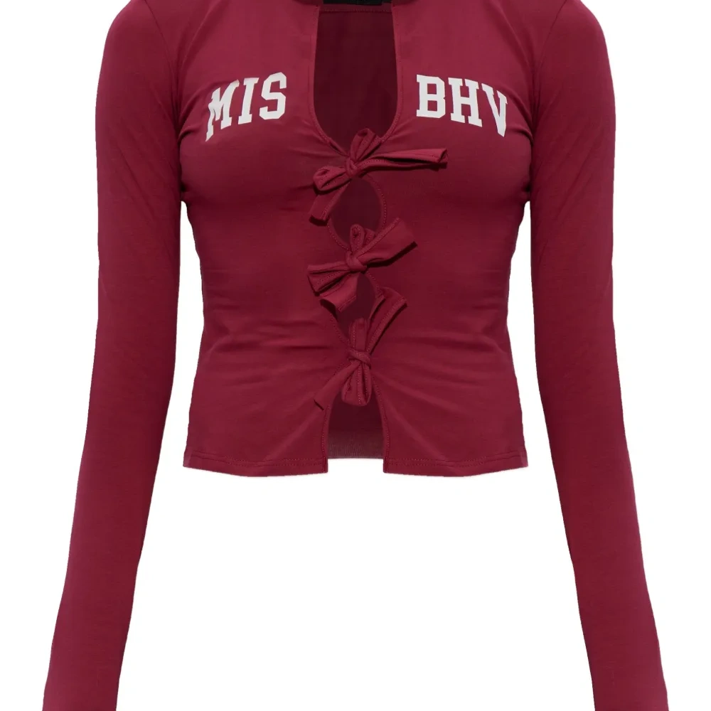 Блузка с бантом