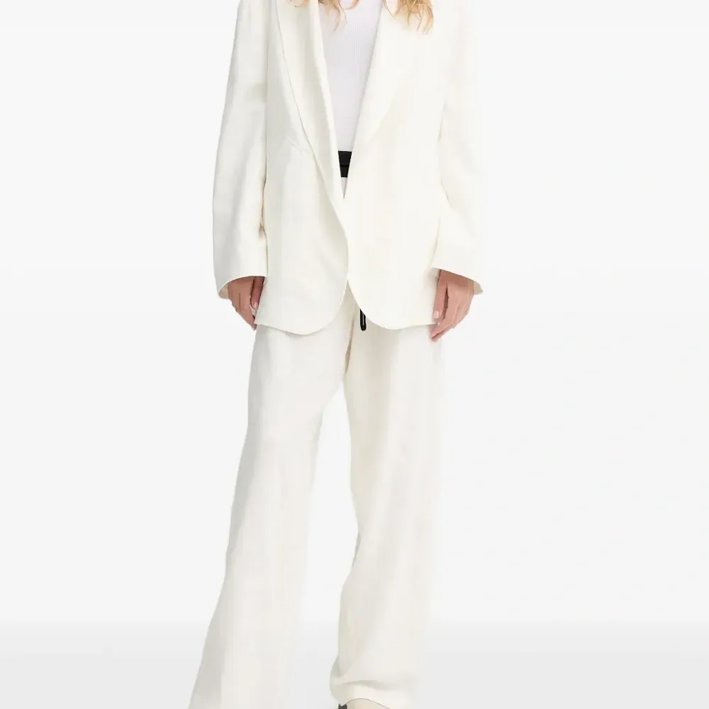 Льняные брюки с карманами