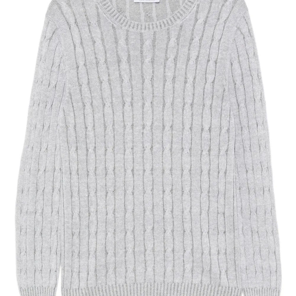 Круглый свитер с косами