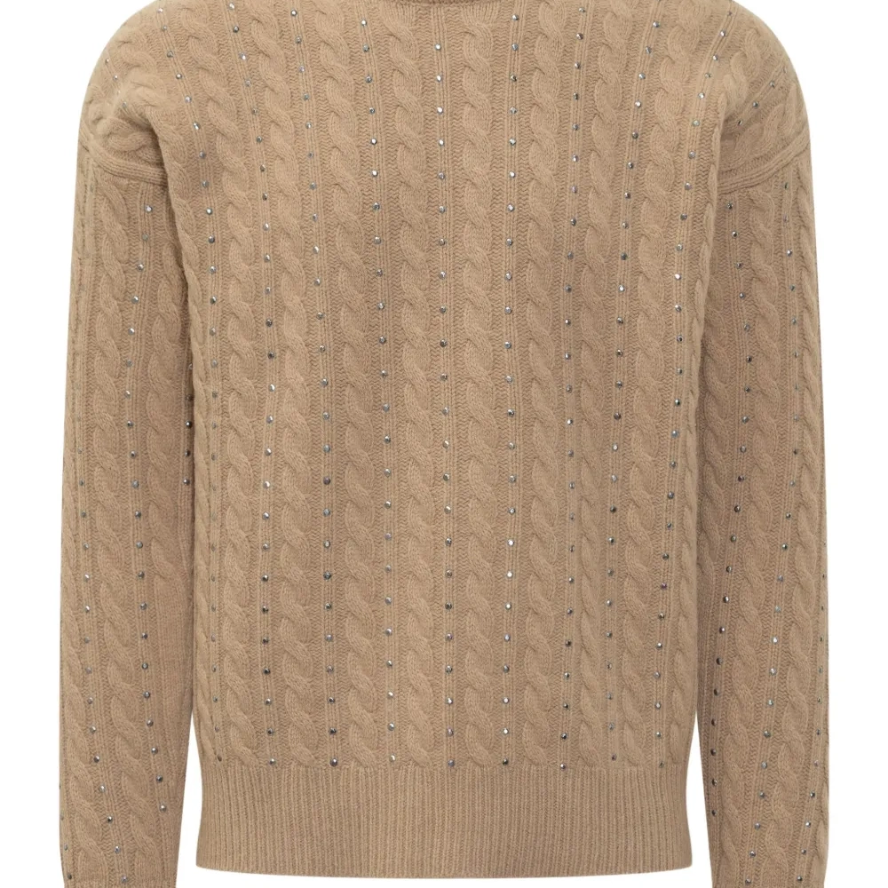 Свитер с косами