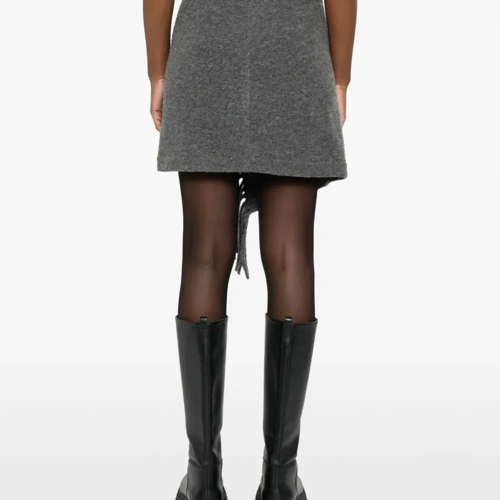 Шерстяная юбка мини с бахромой