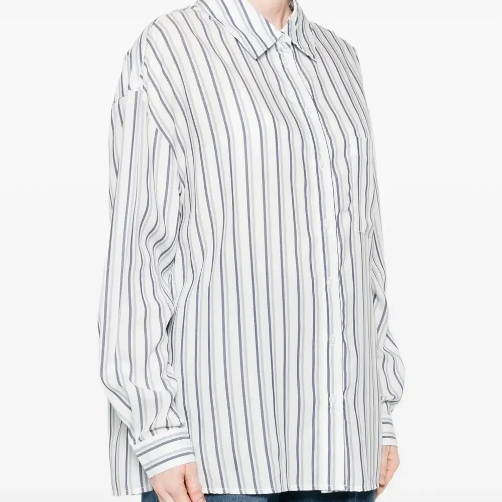 Рубашка в полоску с карманом