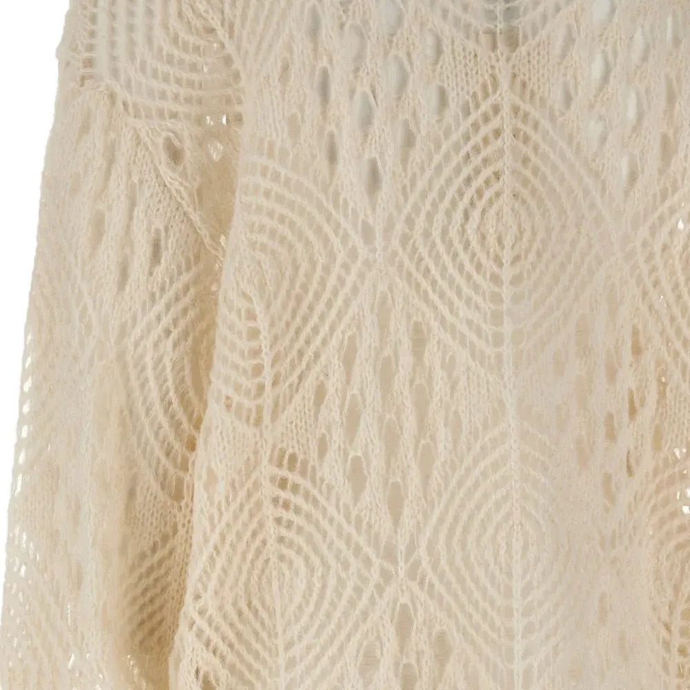 Свободно вязаный свитер с круглым вырезом