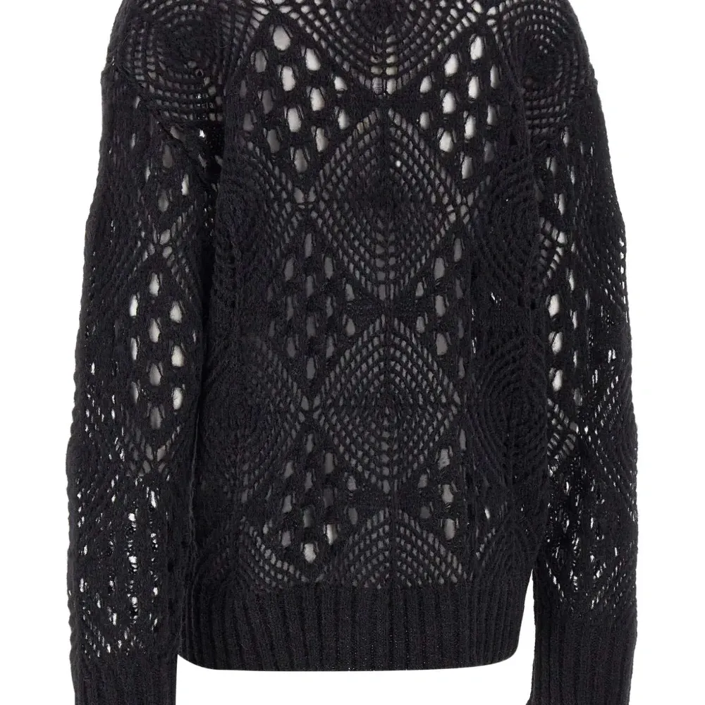 Свободно вязаный свитер с круглым вырезом