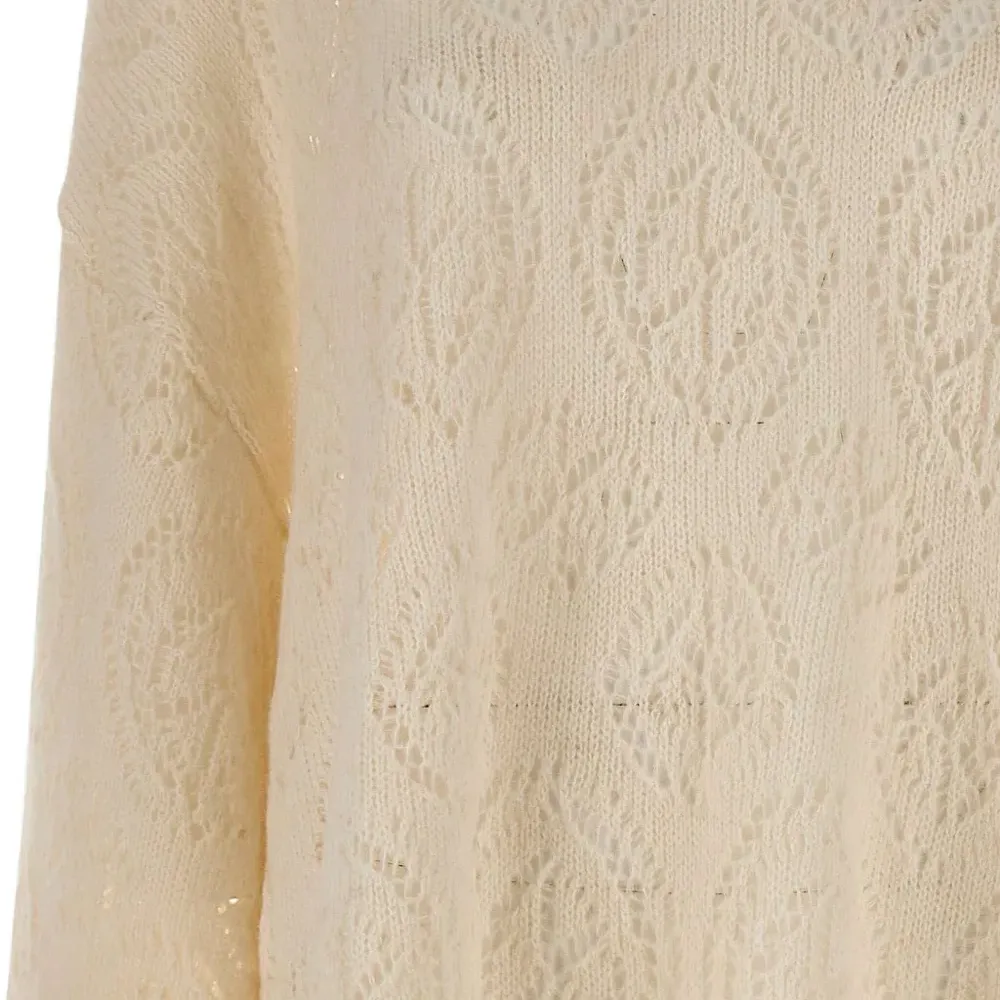 Свитер с широкими рукавами и ажурной вязкой