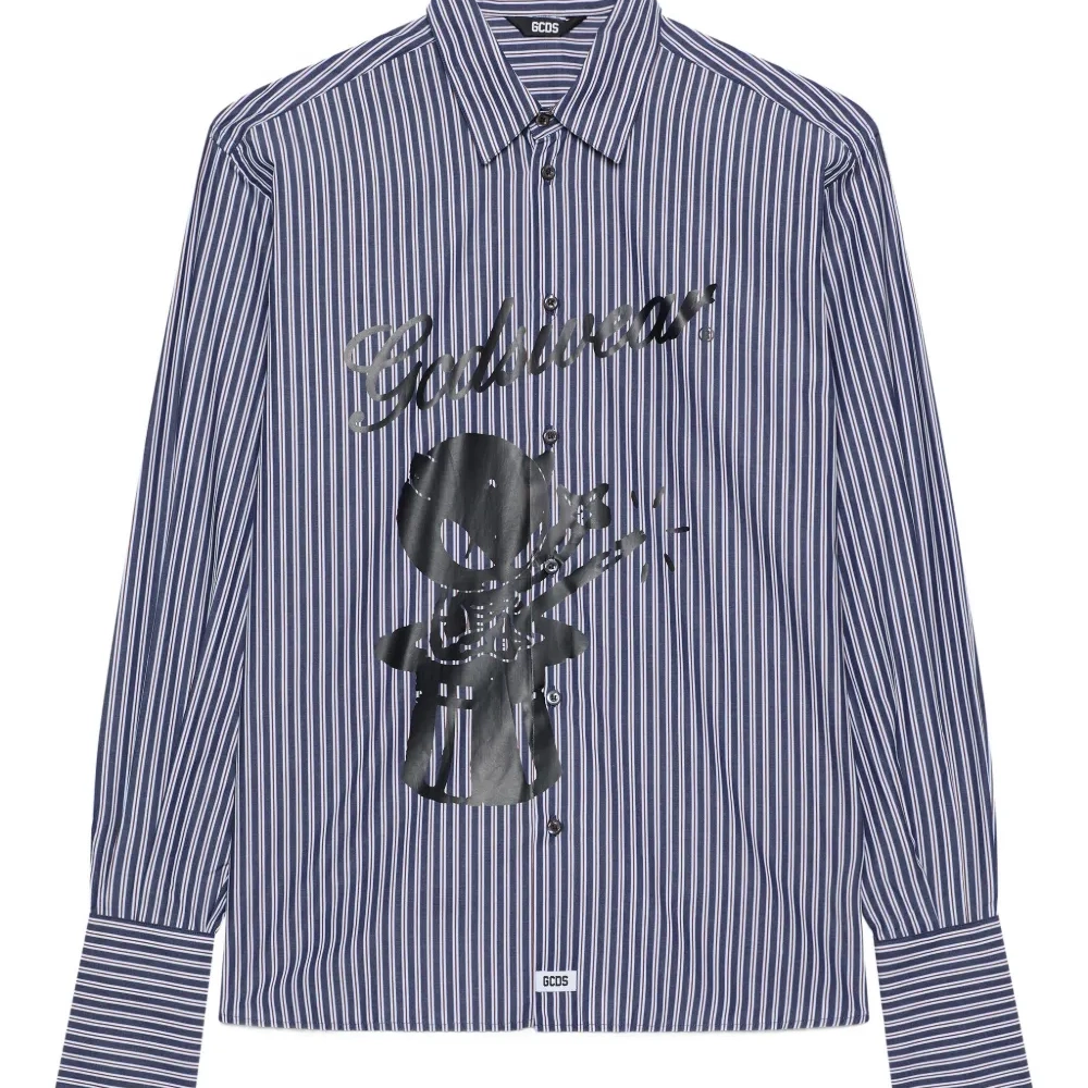 Полосатая рубашка с графичным принтом