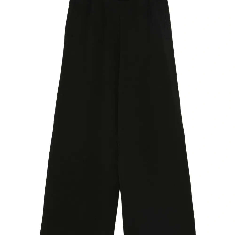 Расклешенные брюки-клеш