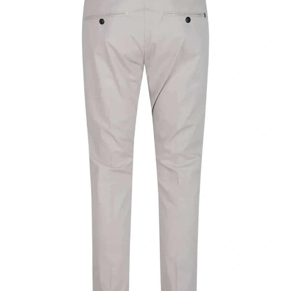 Брюки прямого кроя с защипами и манжетами