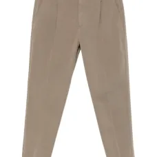 Брюки с защипами и манжетами