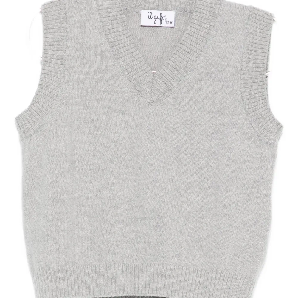 Жилет с V-образным вырезом Жилет с V-образным вырезом