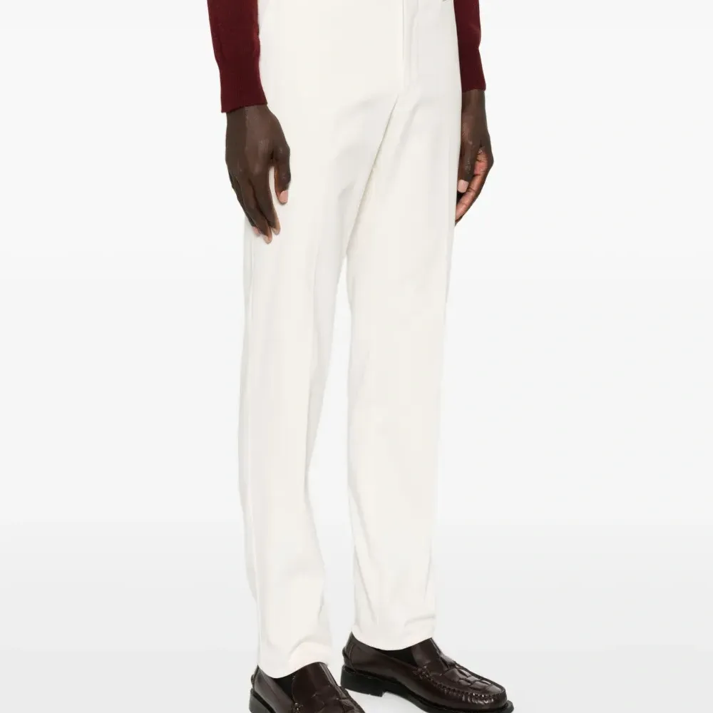 Брюки на пуговицах