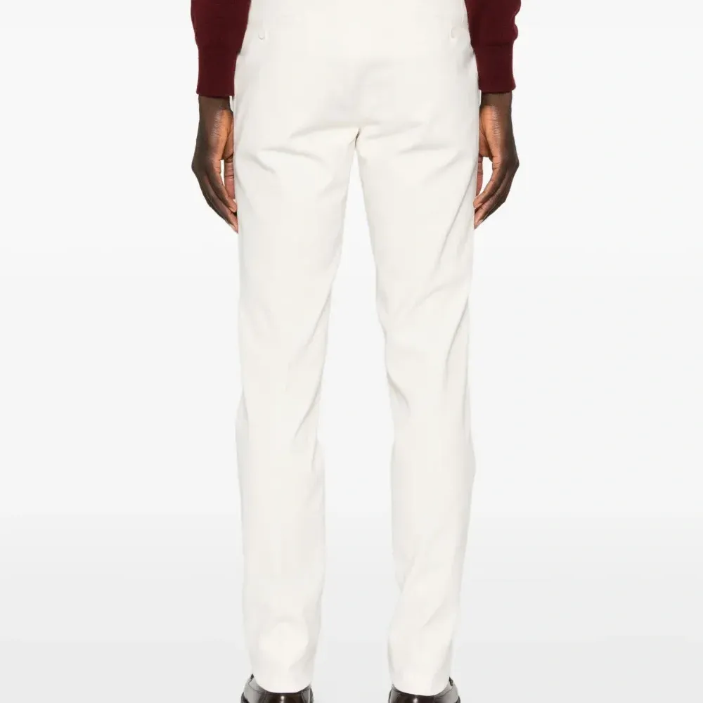 Брюки на пуговицах