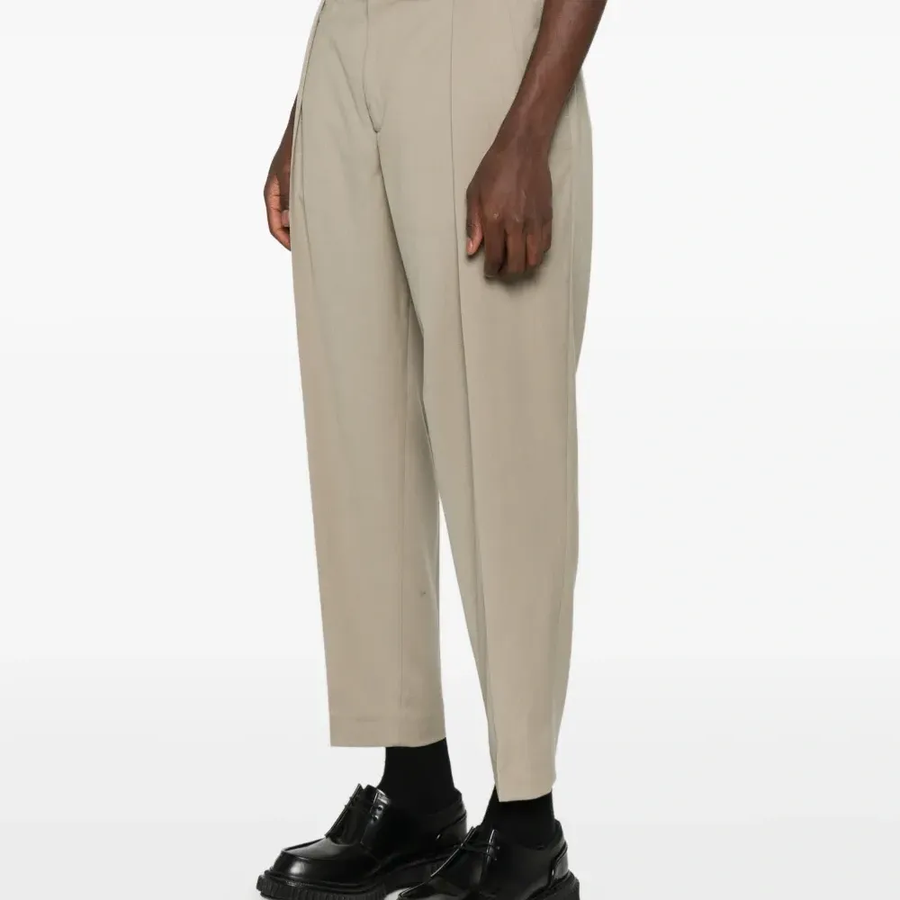 Брюки прямого кроя со складками