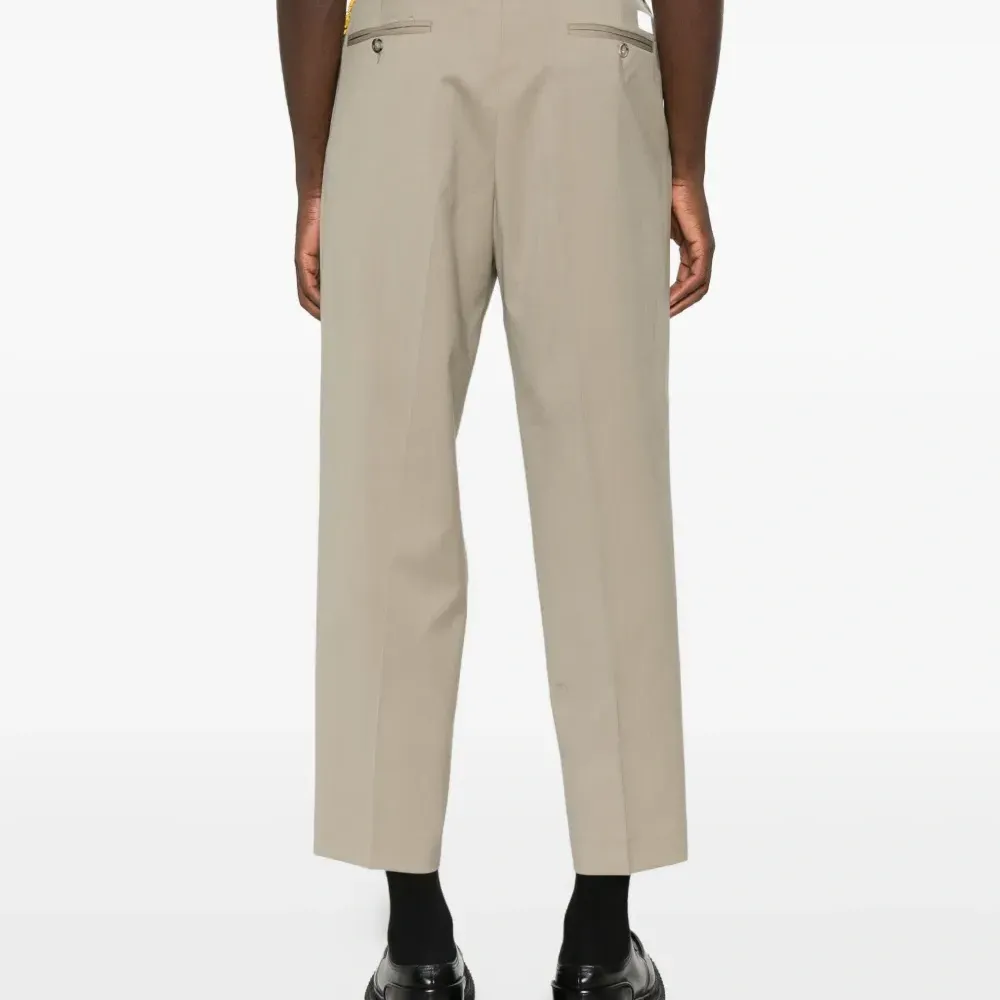 Брюки прямого кроя со складками