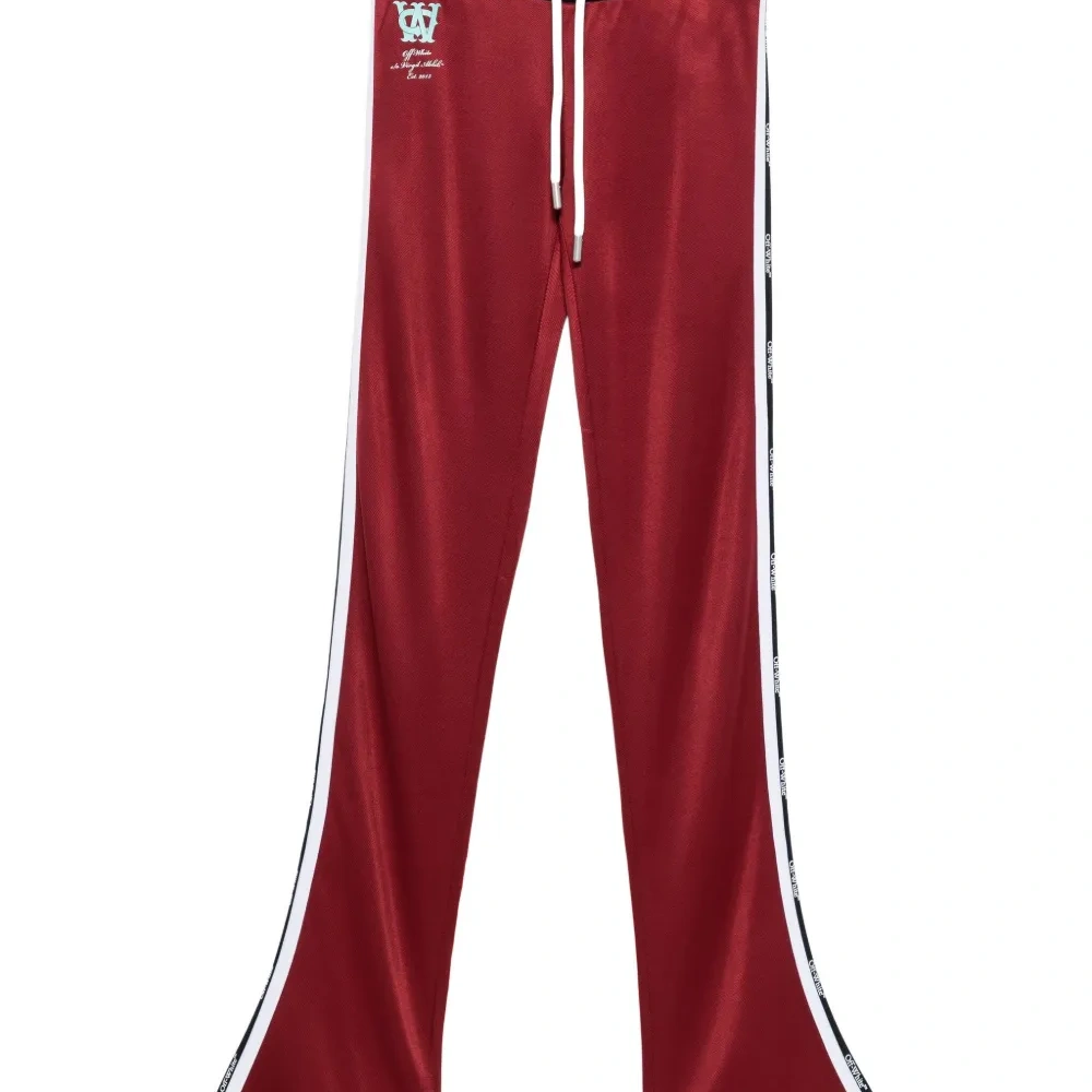 Треники в полоску с логотипом