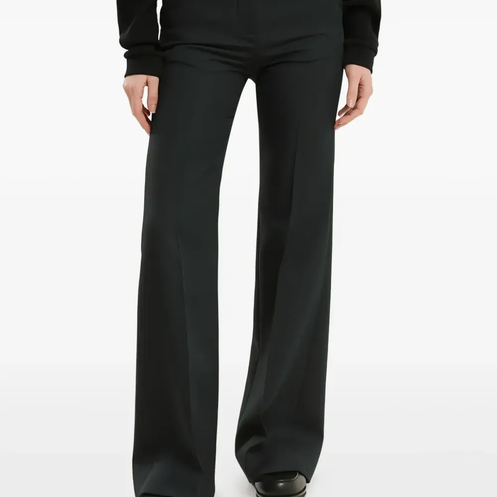 Расклешённые брюки из хлопка