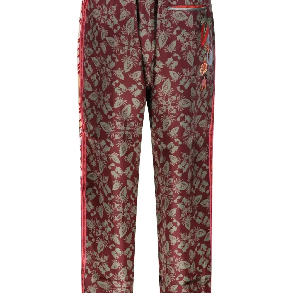 Брюки с цветочным принтом и боковыми лампасами