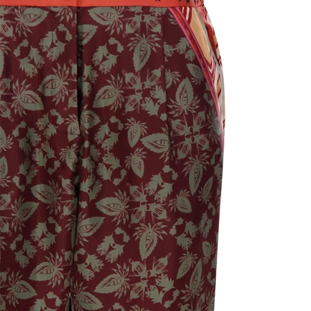 Брюки с цветочным принтом и боковыми лампасами