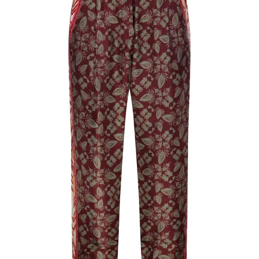 Брюки с цветочным принтом и боковыми лампасами