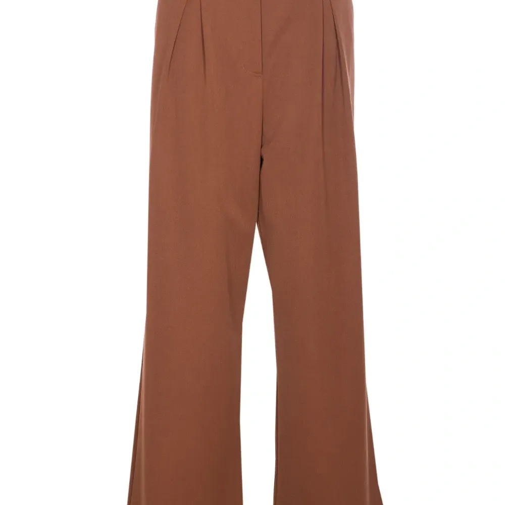 Плиссированные брюки