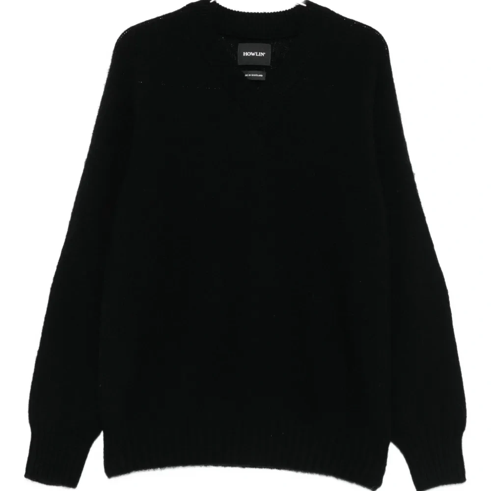 Шерстяной свитер с V-образным вырезом