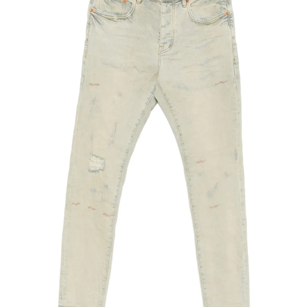 Джинсы с эффектом потертости