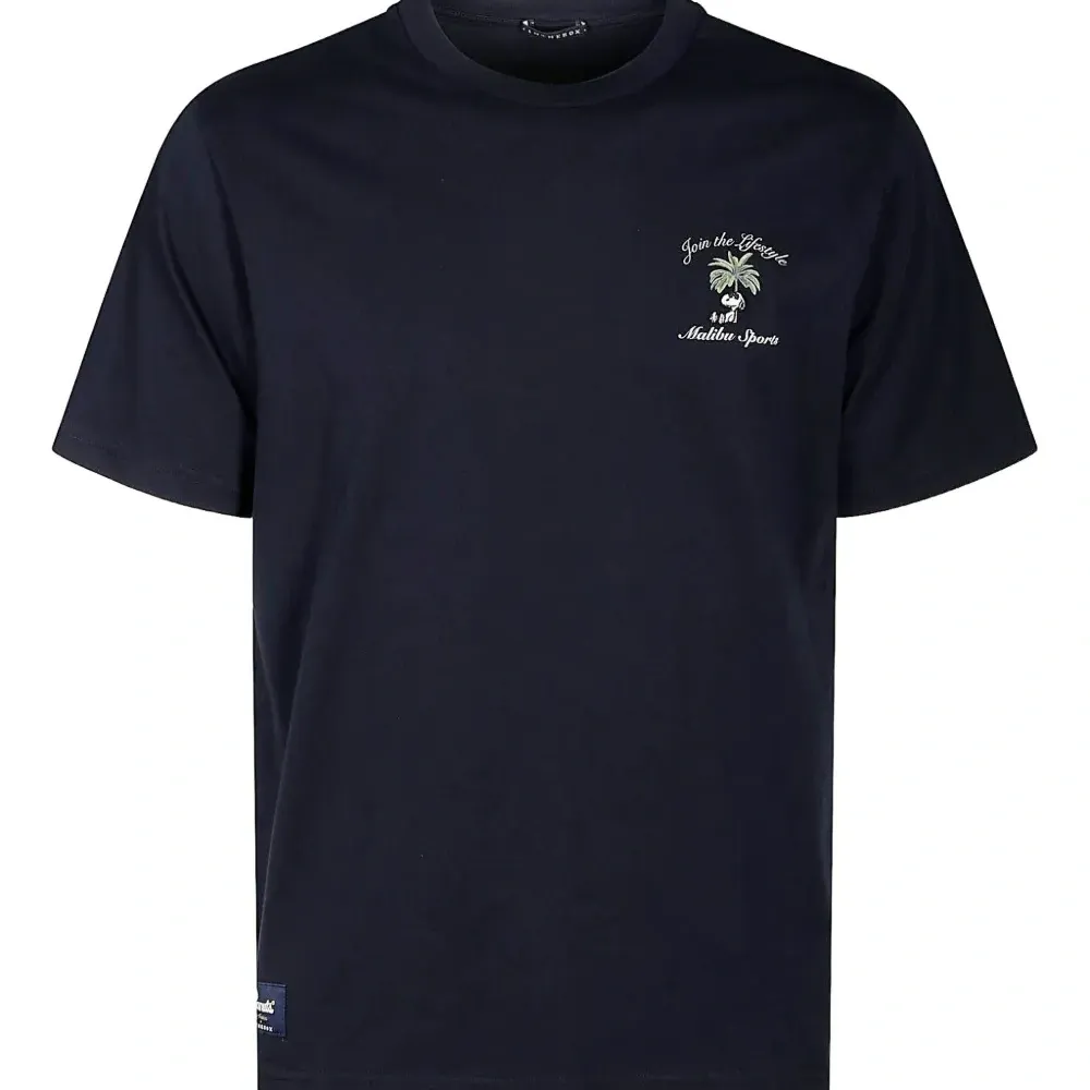 Футболка из коллаборации с Peanuts Футболка из коллаборации с Peanuts