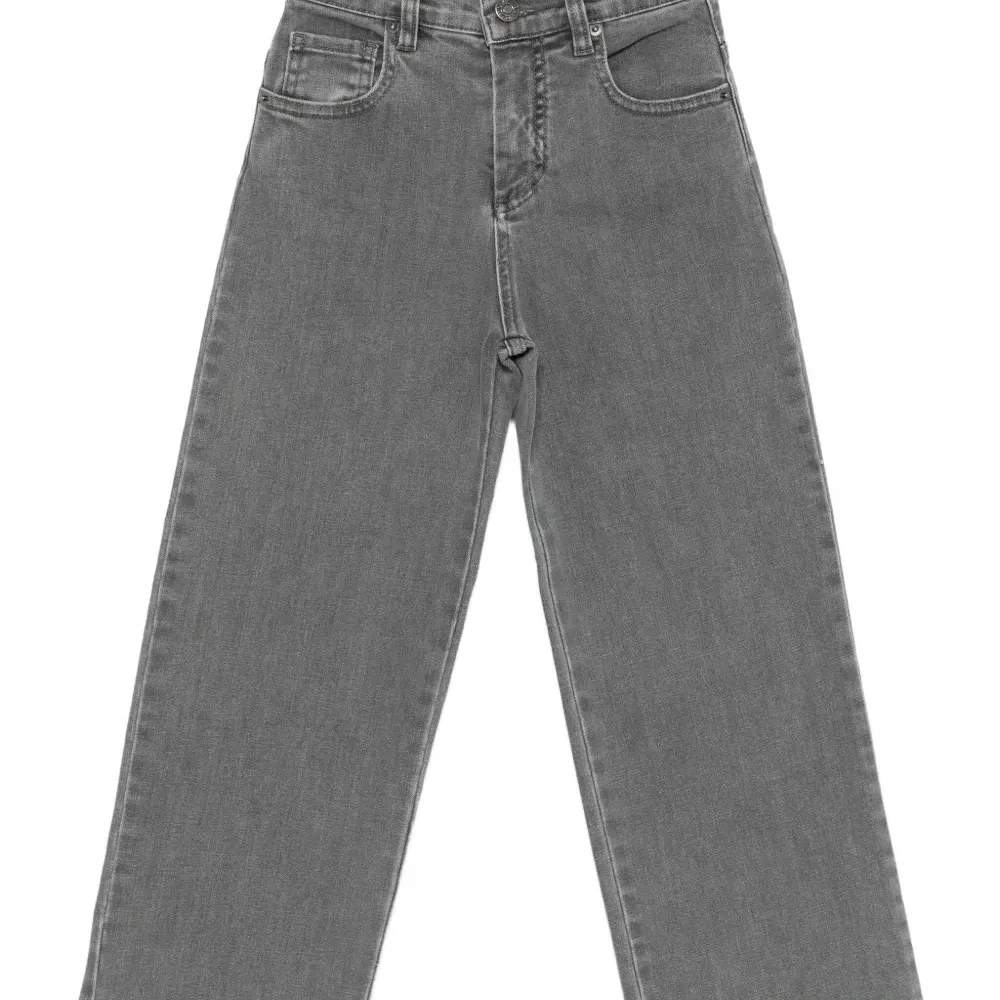 Джинсы с необработанным краем