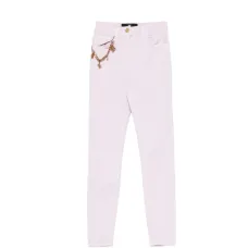 Джинсы с декоративными подвесками