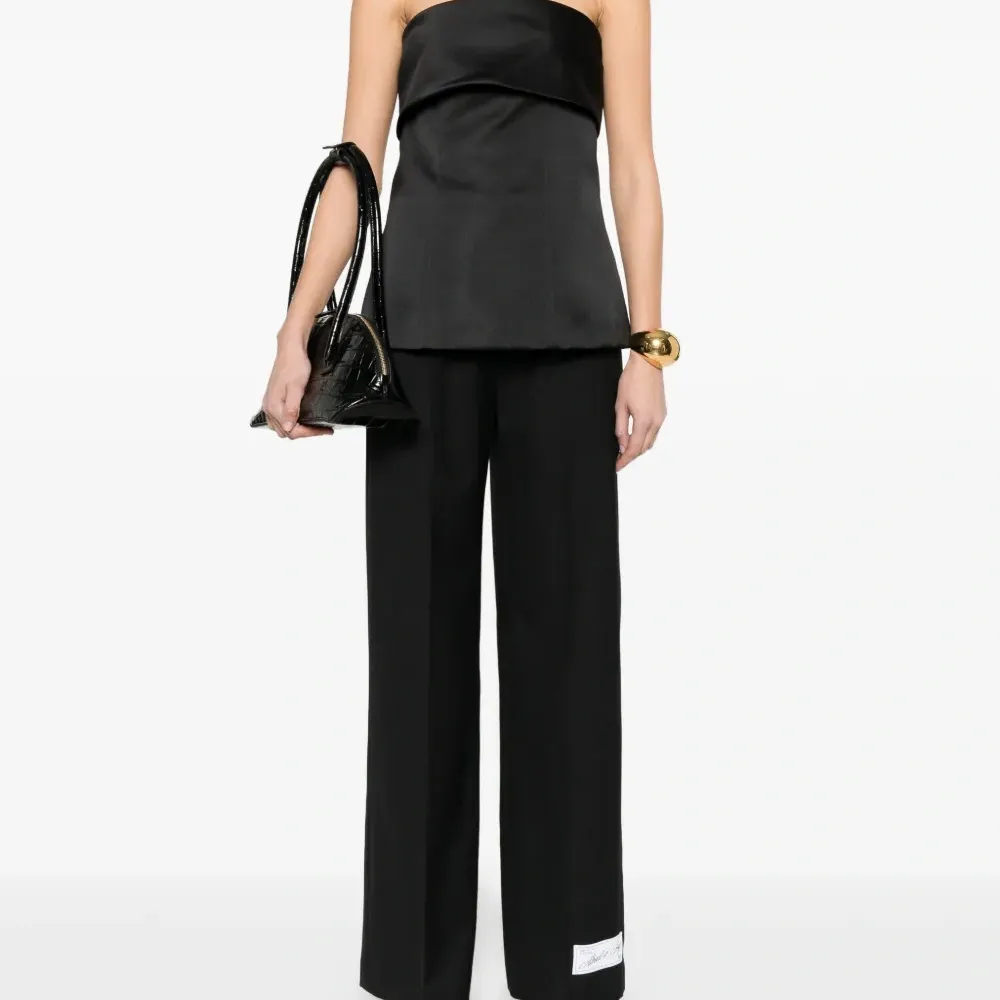 Брюки с прорезными карманами Брюки с прорезными карманами