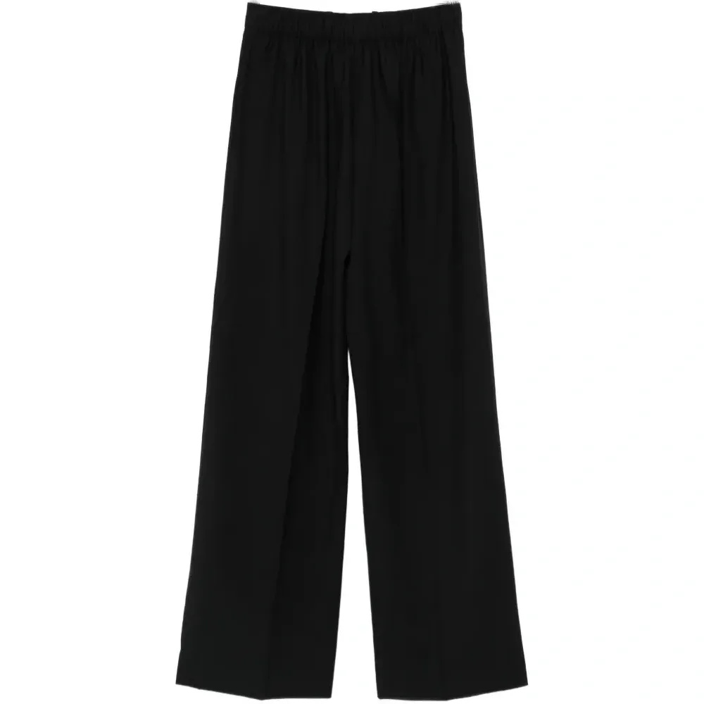 Брюки с прорезными карманами Брюки с прорезными карманами