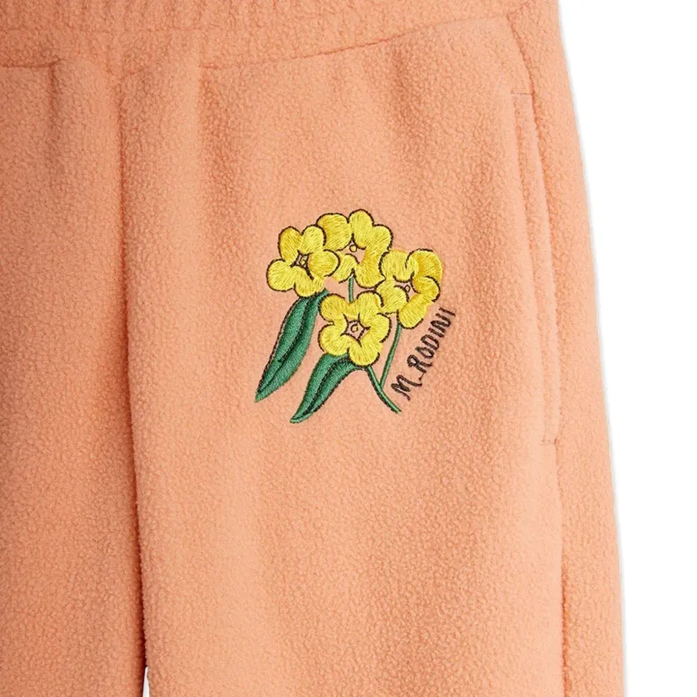 Брюки с цветочной вышивкой