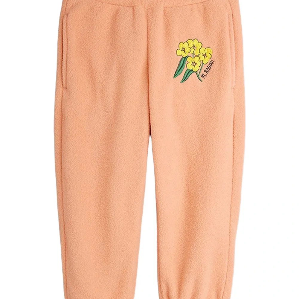 Брюки с цветочной вышивкой