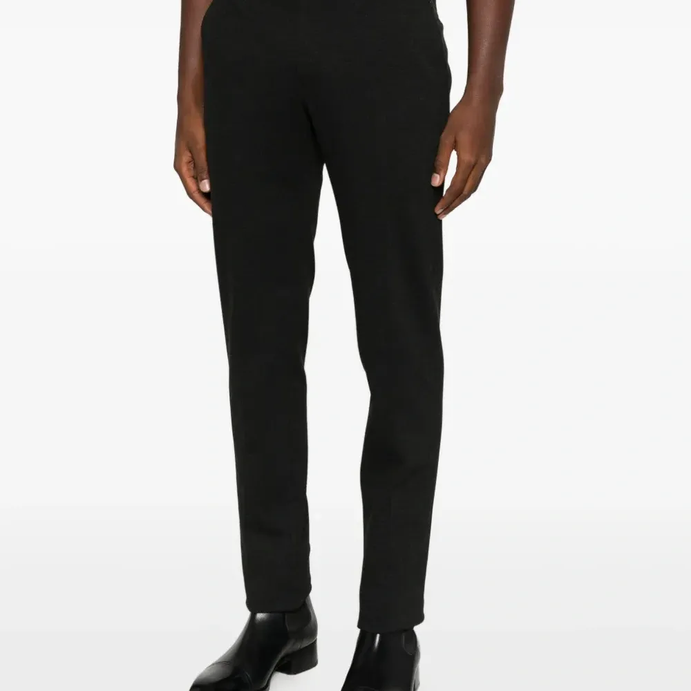 Брюки на пуговицах