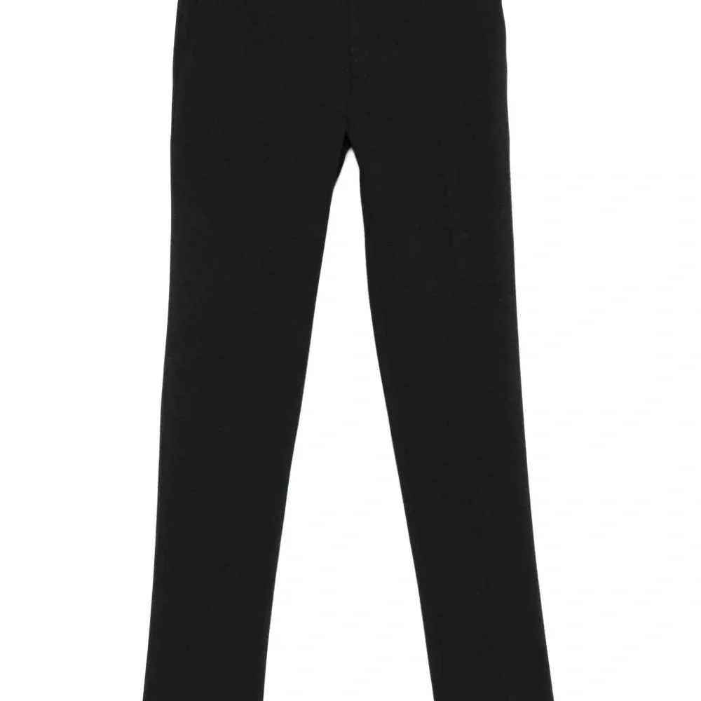 Брюки на пуговицах