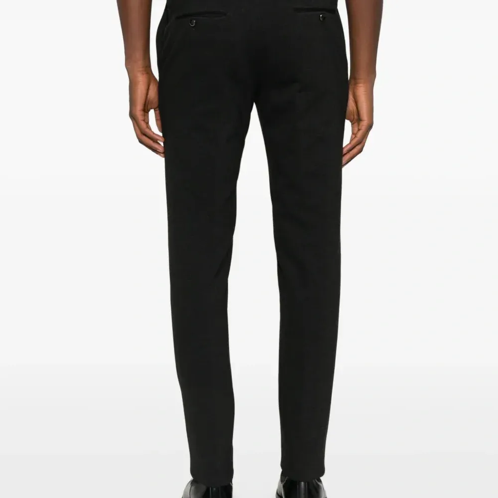 Брюки на пуговицах