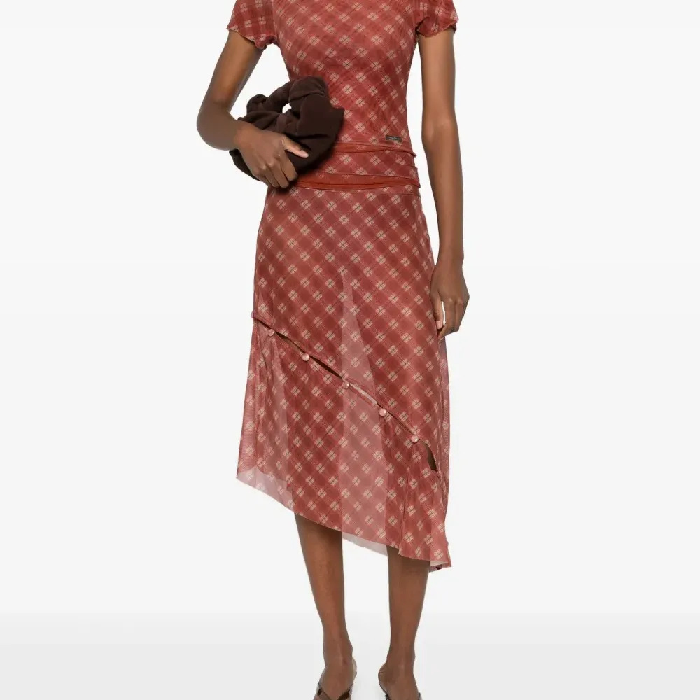 Клетчатая юбка с пуговицами Клетчатая юбка с пуговицами