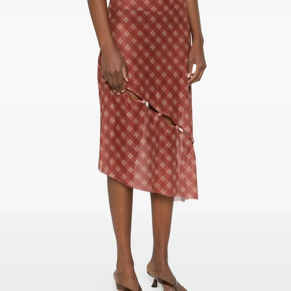 Клетчатая юбка с пуговицами Клетчатая юбка с пуговицами