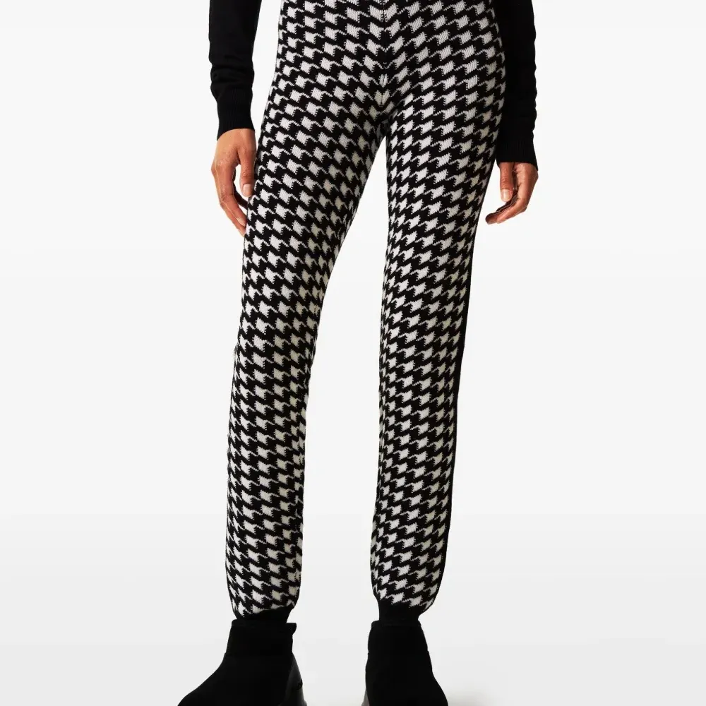 Брюки в ломаную клетку