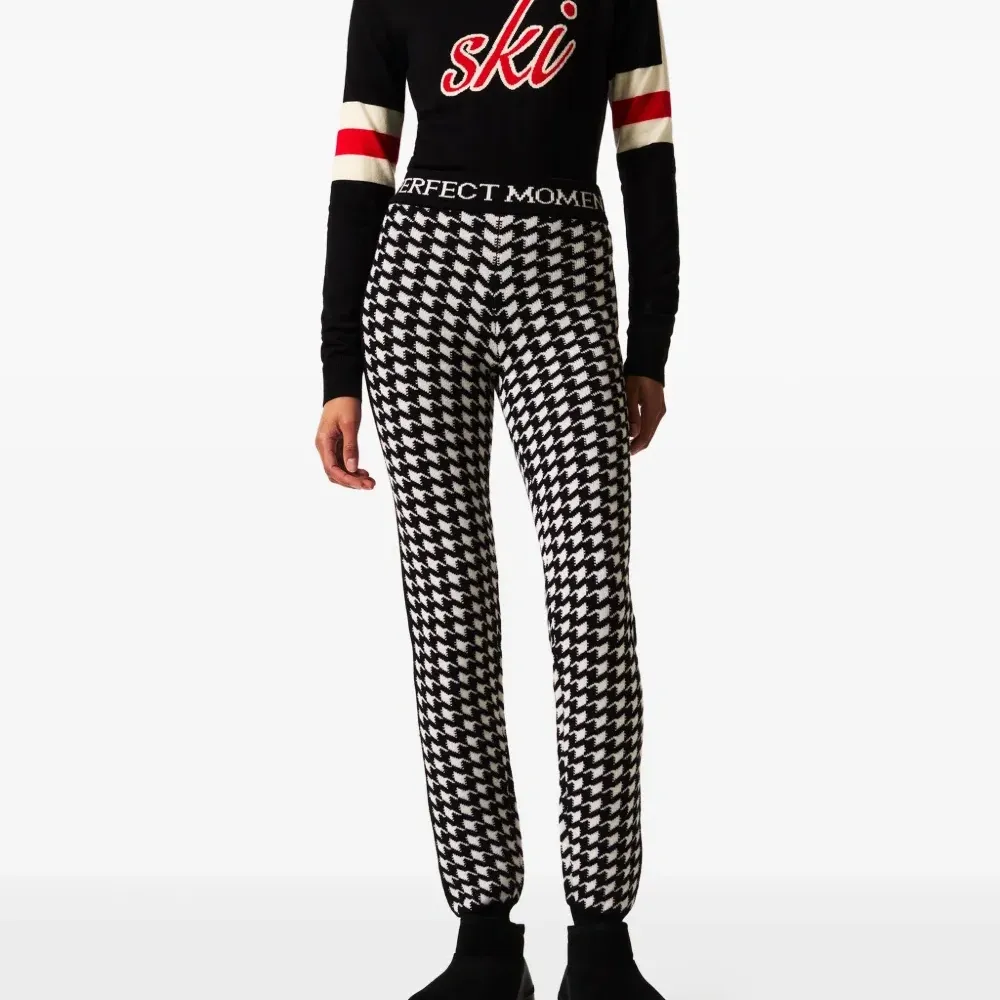 Брюки в ломаную клетку