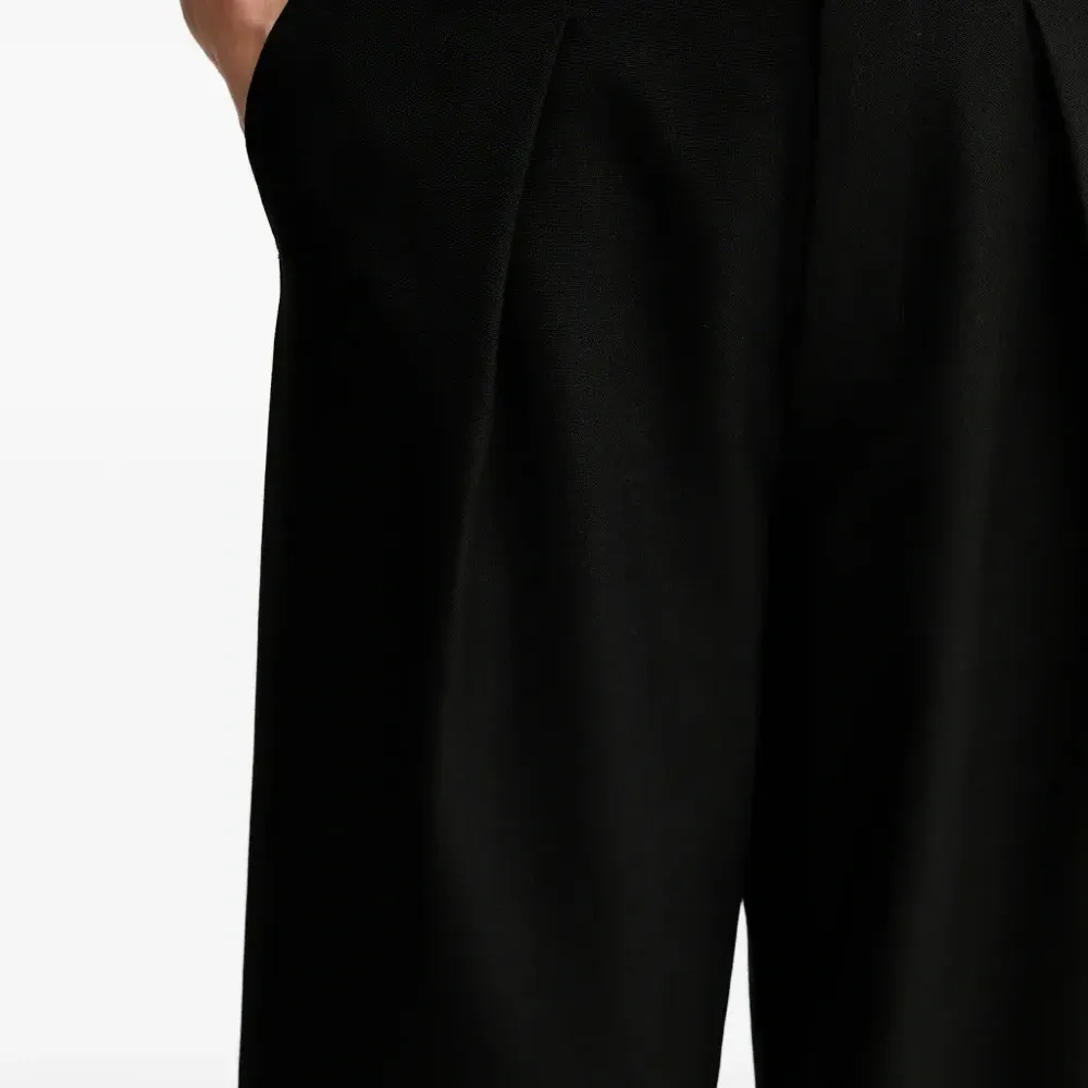 Брюки со складками