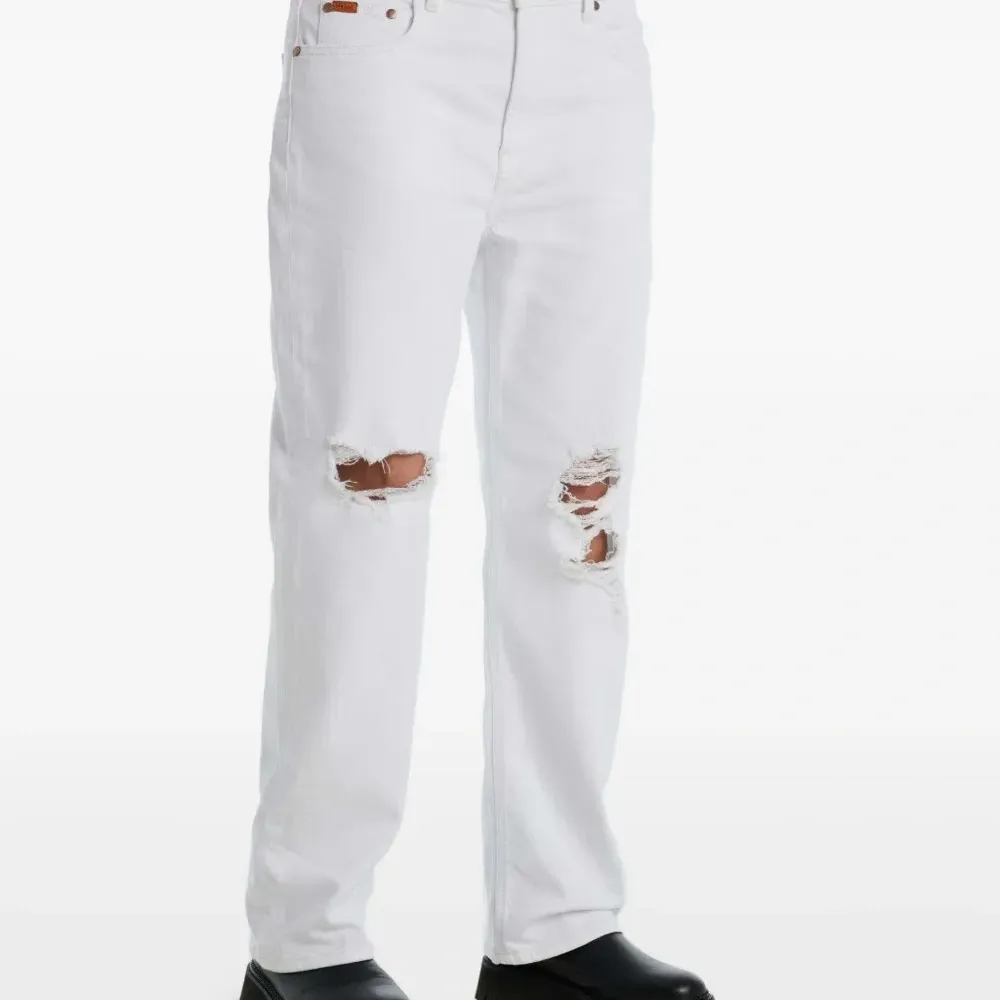 Джинсы Saint с эффектом потертости