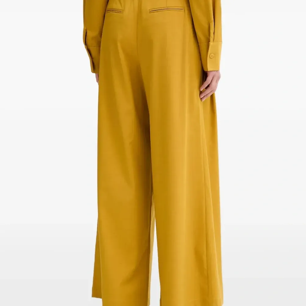 Брюки палаццо с поясом Брюки палаццо с поясом