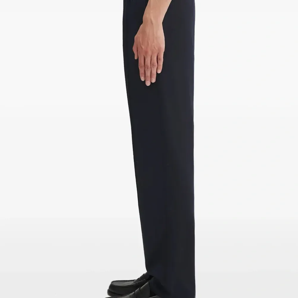 Брюки с декоративными пуговицами